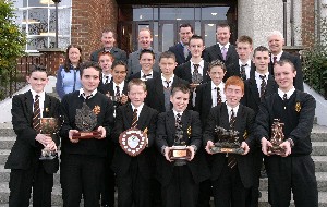 Pictured here are the members of the Irish department in the Abbey Grammar, Mr. Desmond Tennyson, Mr. Maurice Mc Kevitt, Mr. Sean Gallagher and Mr. Sean Mc Clory with the winners of the annual Abbey oral awards for the most fluent speakers of Irish in each year group.